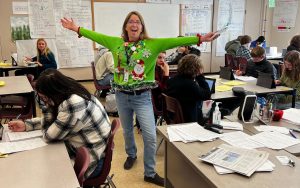 Summit math and computer science teacher Kathy Quick poses in a spirit week costume.