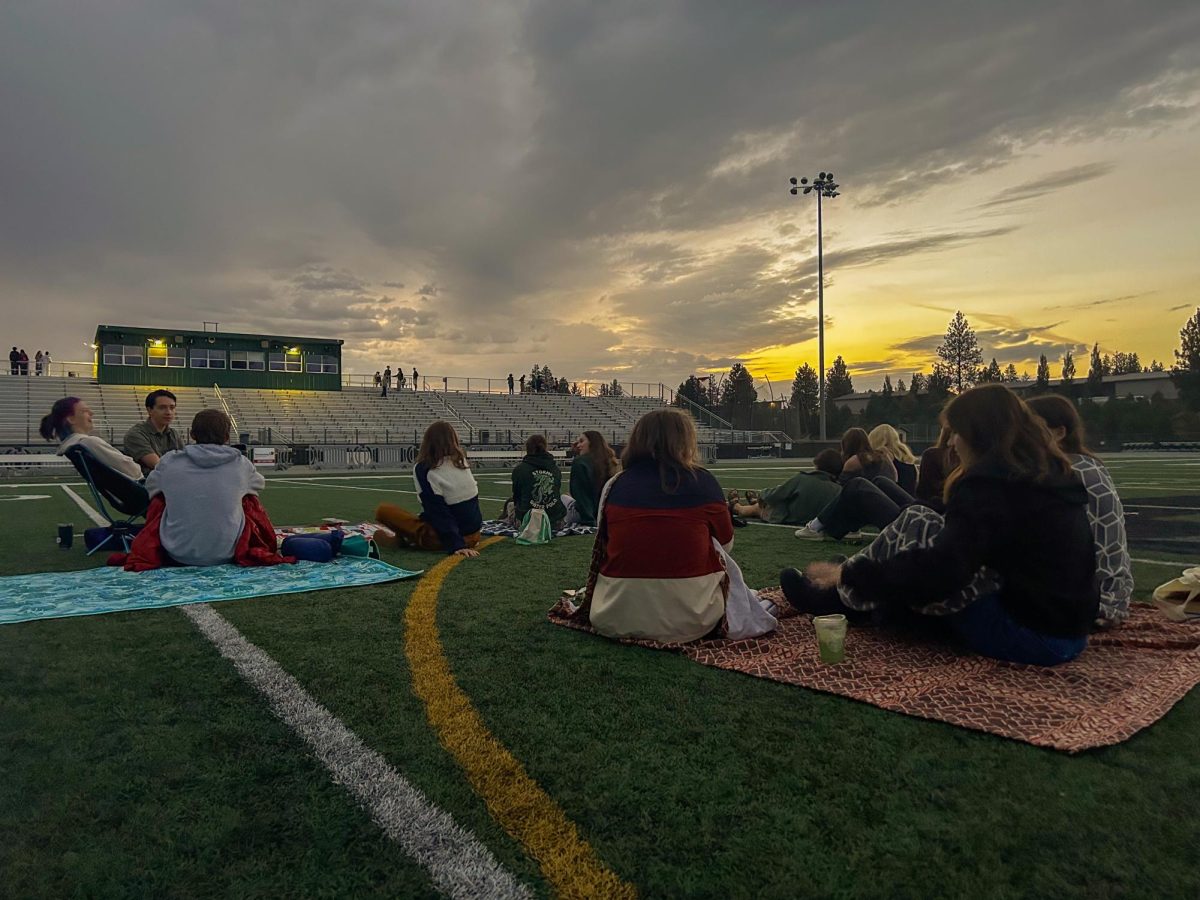 A group of friends enjoy the view at Senior Sunrise on Friday, Sept. 5. / Credit: Lauren Shein